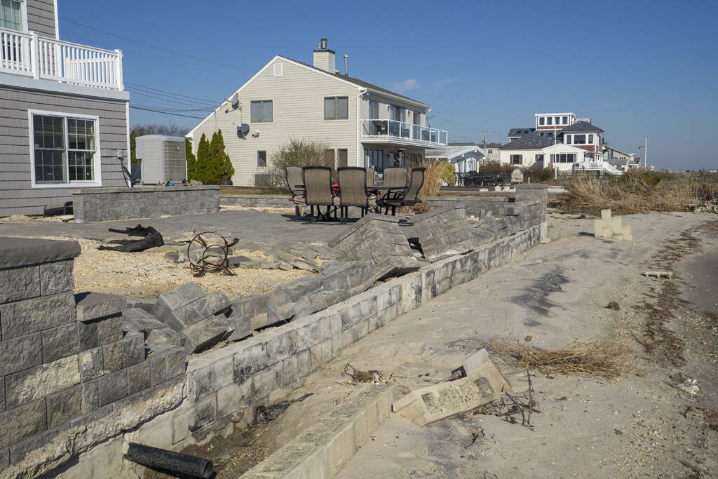 Badly eroded backyards along Forked River Beach