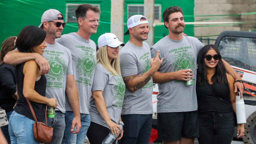 Members of the Four Seasons Total Landscaping team pose for a photo
