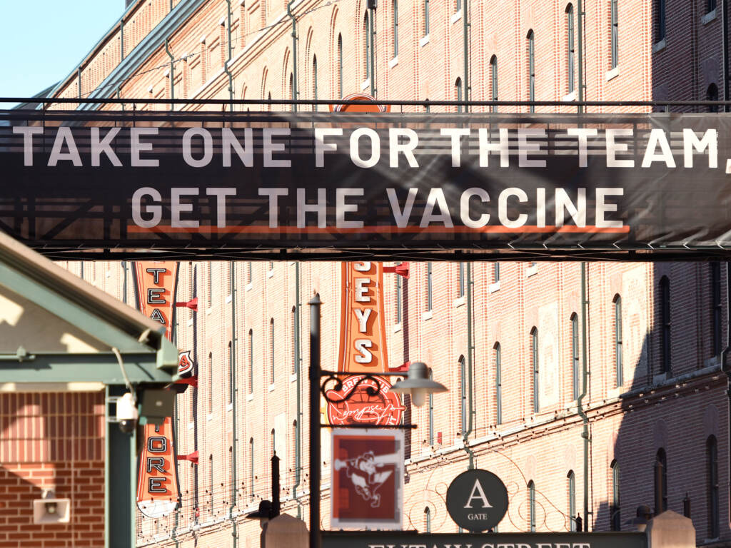A sign outside Camden Yards in Baltimore, Maryland, encourages people to get a COVID-19 vaccine. A sign outside Camden Yards in Baltimore, Maryland, encourages people to get a COVID-19 vaccine.
Mitchell Layton/Getty Images