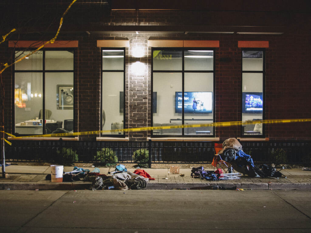 Car Drives Through Holiday Parade In Waukesha, Wisconsin Debris litters the street at a crime scene