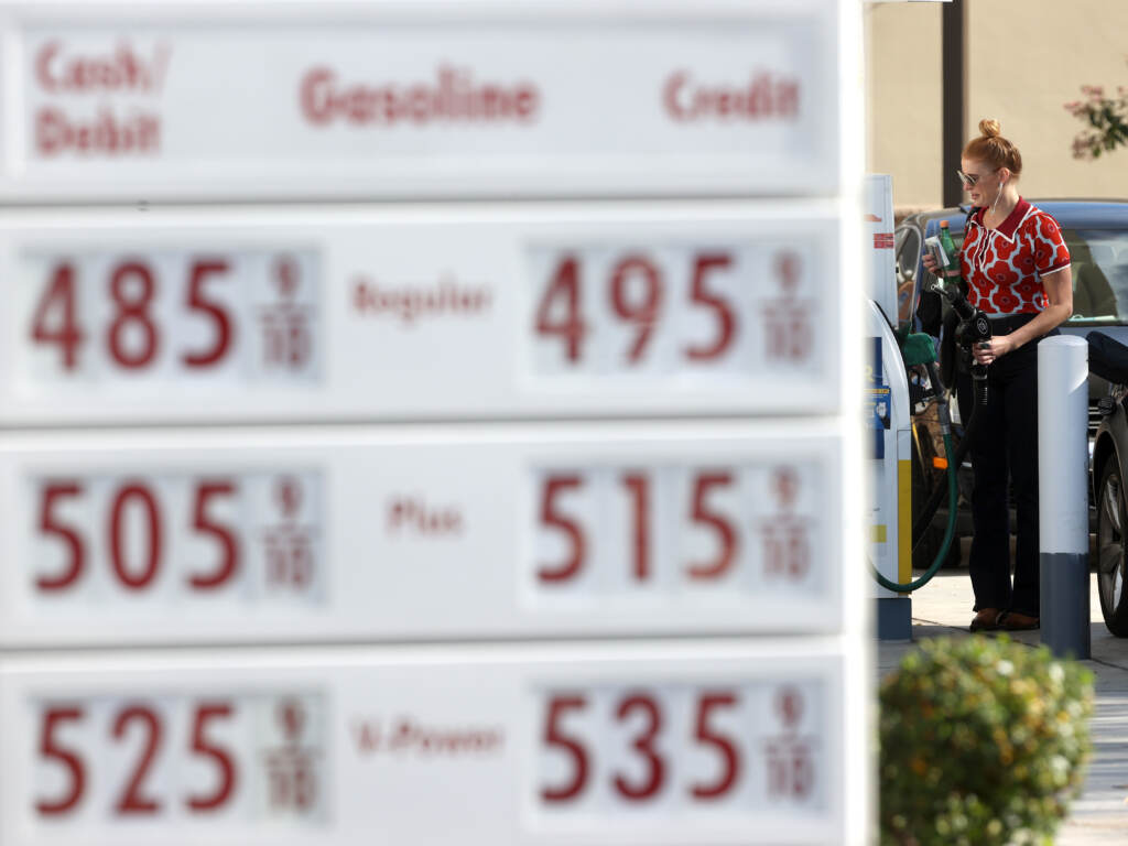 A customer prepares to pump gas into her car at a Shell station on Nov. 17 in San Rafael, Calif. A surge in gas prices this year is leaving the Biden administration looking for options to do something about it. One that's getting recent attention is tapping the country's emergency oil stockpile.
(Justin Sullivan/Getty Images)