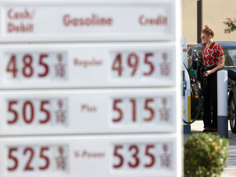A customer prepares to pump gas into her car at a Shell station on Nov. 17 in San Rafael, Calif. A surge in gas prices this year is leaving the Biden administration looking for options to do something about it. One that's getting recent attention is tapping the country's emergency oil stockpile.
(Justin Sullivan/Getty Images)