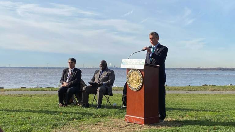 Gov. Carney speaking at a podium.