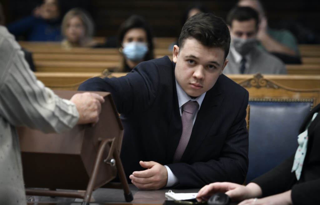 Kyle Rittenhouse pulls numbers of jurors out of a tumbler during his trial