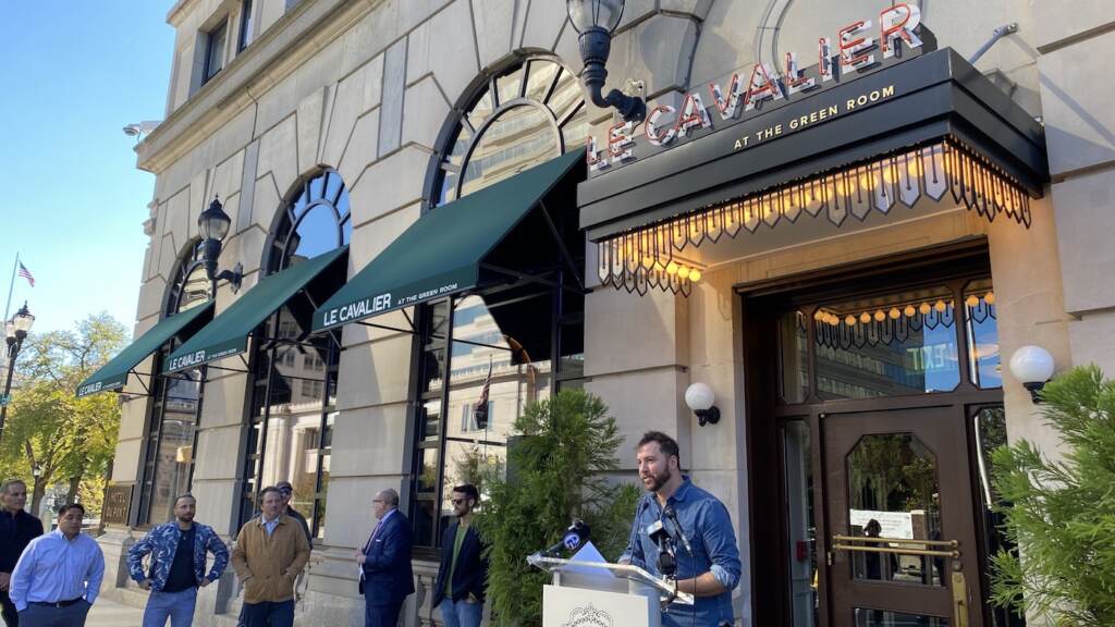 le-cavalier-wilmington-eichmann Chef Tyler Akin talks outside his restaurant Le Cavalier about plans for Wilmington restaurants to team up with celebrity chefs to raise money to support the Independent Restaurant Coalition’s efforts to help eateries damaged by the pandemic. (Mark Eichmann/WHYY)