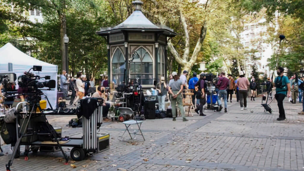 Crew members are scene on set in Rittenhouse Square