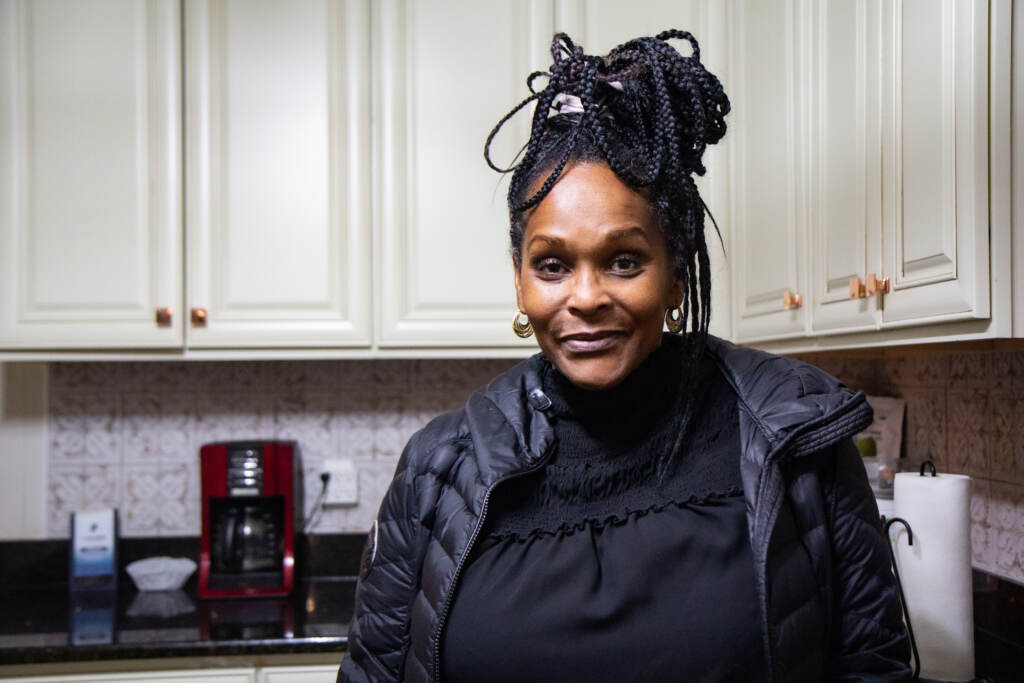 philly-relocation-violence-KP-111621-03 Sonja Bingham stands in her kitchen