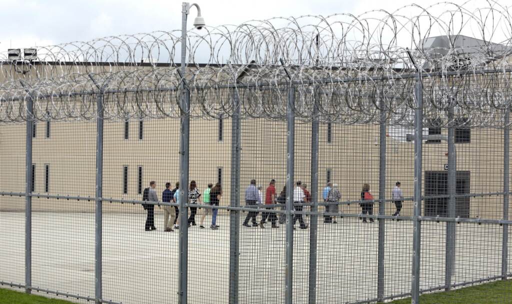 prison-e1582626587253-1920×1138 People walk on a tour of the West section of the State Correctional Institution at Phoenix in Collegeville, Pa