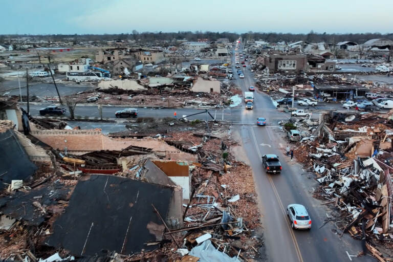 Aftermath of tornado in Mayfield, Kentucky. (Brandon Clement/WXChasing YouTube)