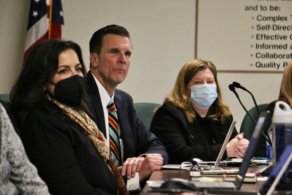 Tabitha Dell'Angelo (left) and Jim Pepper (center) take their seats