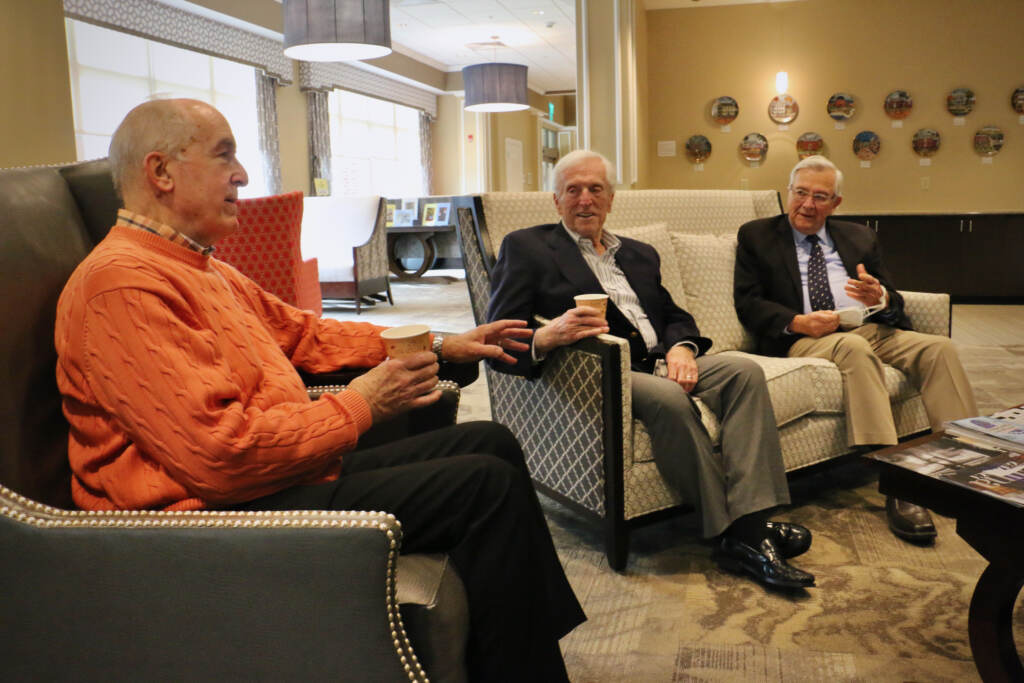 2021 12 21-e lee-fred crotchfelt jerry dobbs ron masters-oxford pa ware presbyterian village-seniors react to hospital closing Ware Presbyterian Village residents (from left) Fred Crotchfelt, Jerry Dobbs and Ron Masters gather near the fireplace