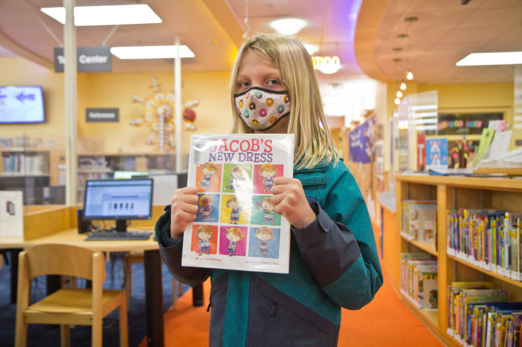 Connor holds a favorite book at the Abington Library. (Kimberly Paynter/WHYY) Connor holds a favorite book at the Abington Township Public Library. (Kimberly Paynter/WHYY)