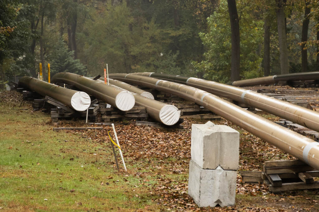 In this Oct. 22, 2019 file photo, pipes lay along a construction site on the Mariner East pipeline in a residential neighborhood in Exton, Pa