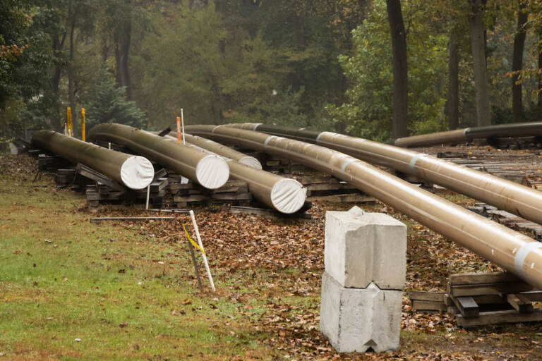 In this Oct. 22, 2019 file photo, pipes lay along a construction site on the Mariner East pipeline in a residential neighborhood in Exton, Pa
