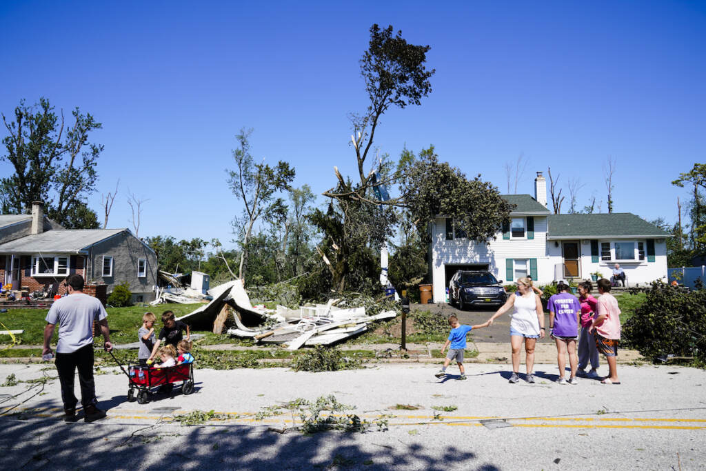Tropical Weather Atlantic File photo: People inspect damage in Fort Washington, Pa. Thursday, Sept. 2, 2021 in the aftermath of downpours and high winds from the remnants of Hurricane Ida that hit the area.