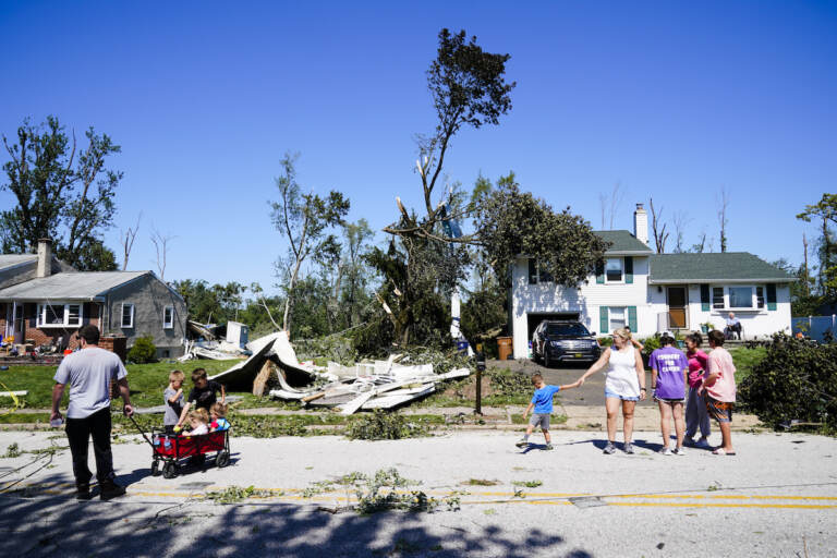 File photo: People inspect damage in Fort Washington, Pa. Thursday, Sept. 2, 2021 in the aftermath of downpours and high winds from the remnants of Hurricane Ida that hit the area.