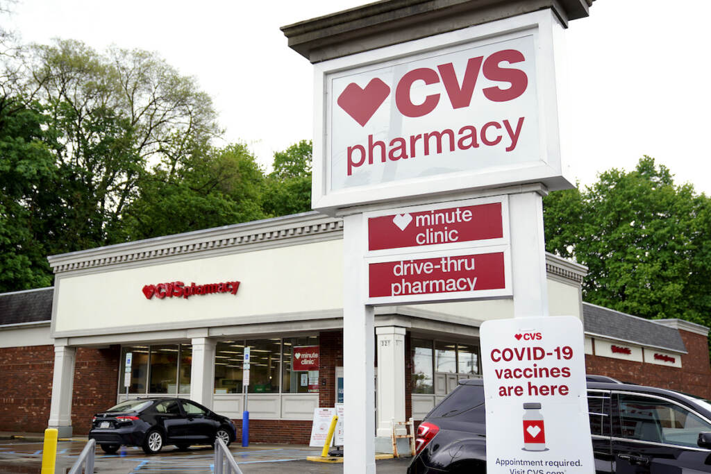 CVS Health-Store Closures Vehicles are parked in front of a CVS Pharmacy in Mount Lebanon, Pa., on Monday May 3, 2021. CVS Health will close hundreds of drugstores over the next three years, as the retail giant adjusts to changing customer needs and converts to new store formats. The company said Thursday, Nov. 18, that it will close about 300 stores a year for the next three years as it looks to reduce store count density in some locations.