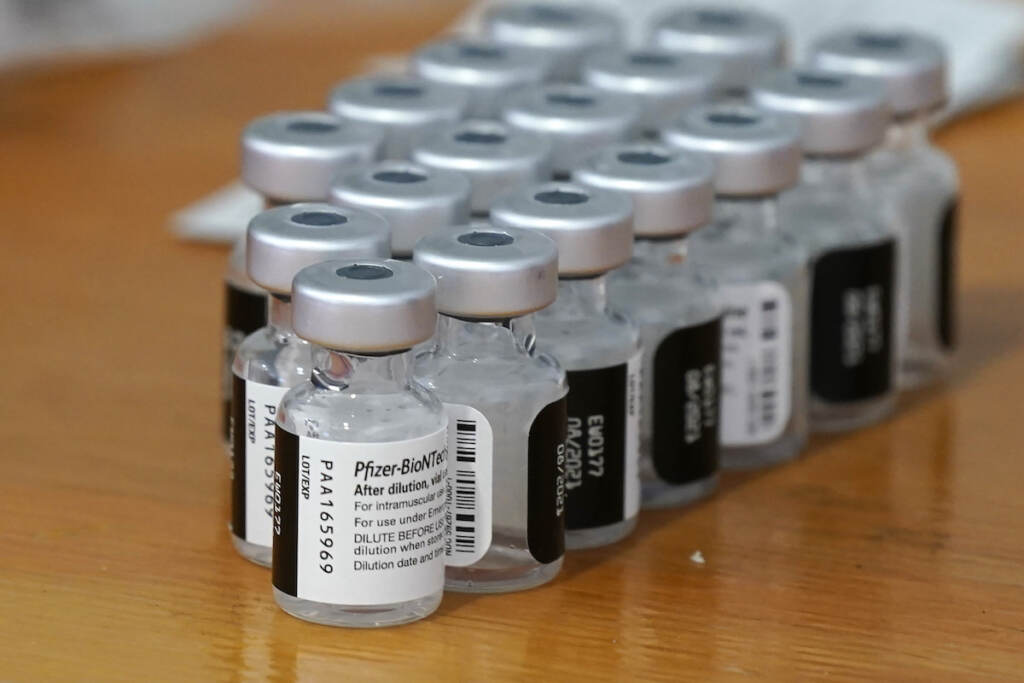 Virus Outbreak US Pfizer COVID-19 vaccines sit ready for use at a Dallas County Health and Human Services drive up vaccine site in Mesquite, Texas, Nov. 30, 2021. While all eyes are on the new and little-understood omicron variant, the delta form of the coronavirus isn't finished wreaking havoc in the U.S. There is much that is unknown about omicron, including whether it is more contagious than previous versions, makes people sicker or more easily thwarts the vaccine or breaks through the immunity that people get from a bout of COVID-19