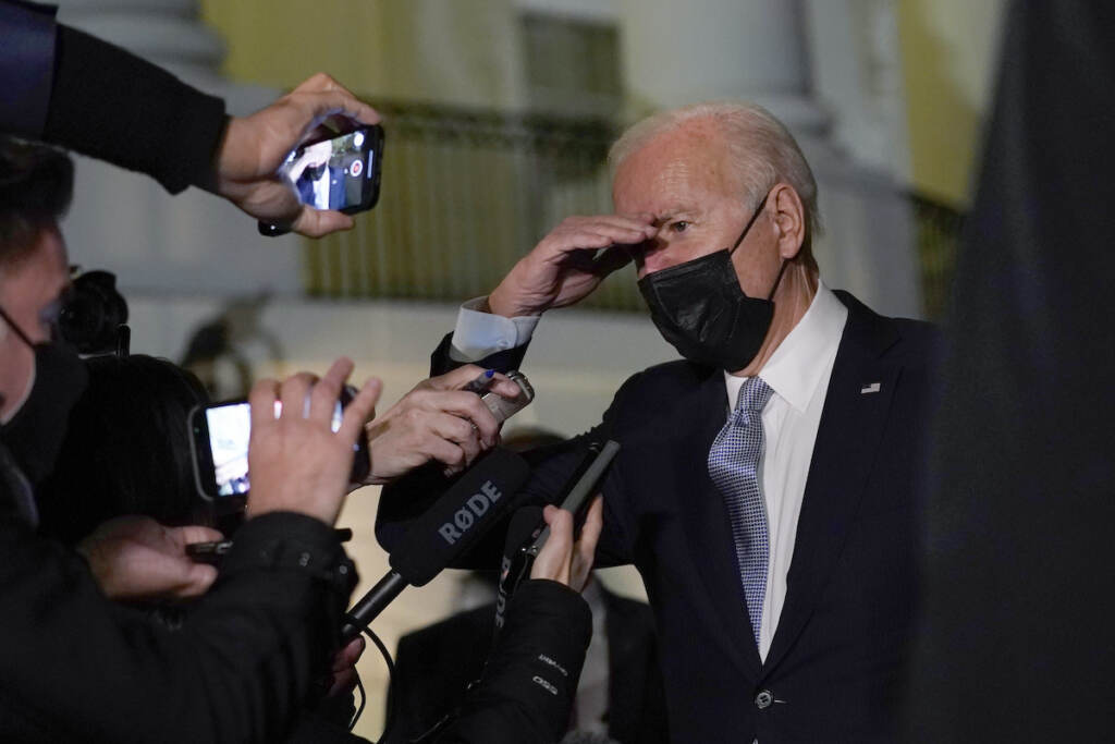 Biden President Joe Biden talks with reporters at the White House in Washington, Friday, Dec. 3, 2021, as he prepares to leave for Camp David