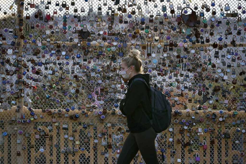 AP Poll Generation Z Pandemic Locks cover the fence on the Love Bridge