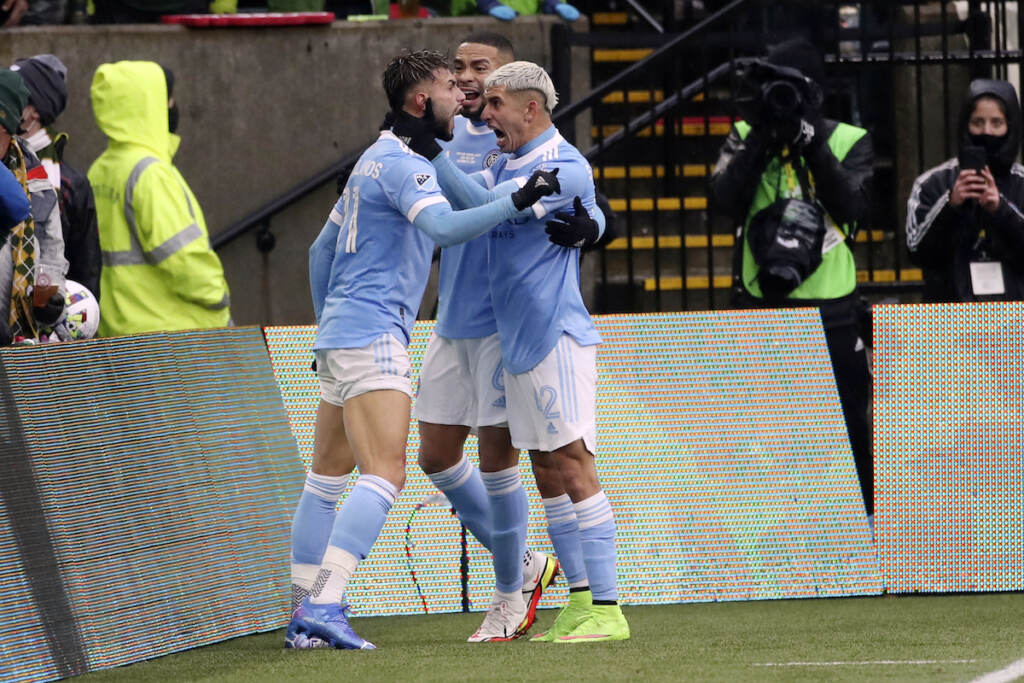 New York City FC forward Valentin Castellanos (11) celebrates his goal with teammates during the first half of the MLS Cup soccer match against Portland Timbers on Saturday, Dec. 11, 2021, in Portland, Ore