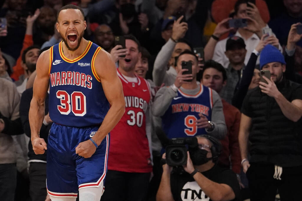 APTOPIX Warriors Knicks Basketball Golden State Warriors guard Stephen Curry reacts after scoring a 3-point basket during the first half of an NBA basketball game against the New York Knicks, Tuesday, Dec. 14, 2021, at Madison Square Garden in New York. Curry hit his 2,974th 3-pointer Tuesday night in the first quarter, breaking the record set by Ray Allen.