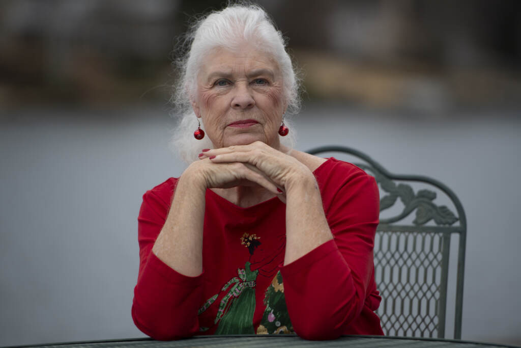 Virus Outbreak Funeral Costs Wanda Olson poses for a photo, Friday, Dec. 17, 2021, in Villa Rica, Ga. When Olson’s son-in-law died in March after contracting COVID-19, she and her daughter had to grapple with more than just their sudden grief. They had to come up with money for a cremation. Even without a funeral, the bill came to nearly $2,000, a hefty sum that Olson initially covered. (AP Photo/Mike Stewart)