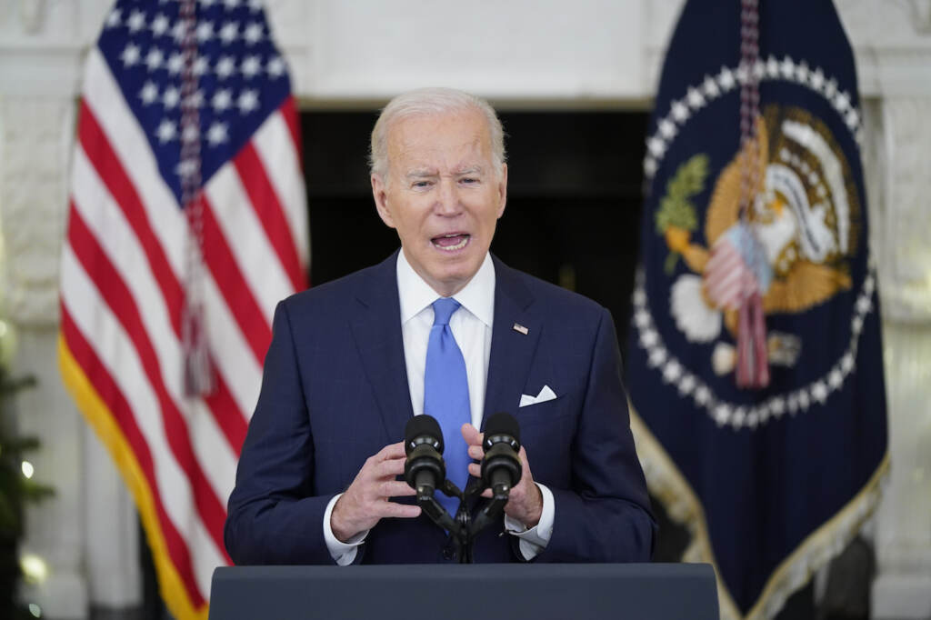 Joe Biden President Joe Biden speaks from a podium