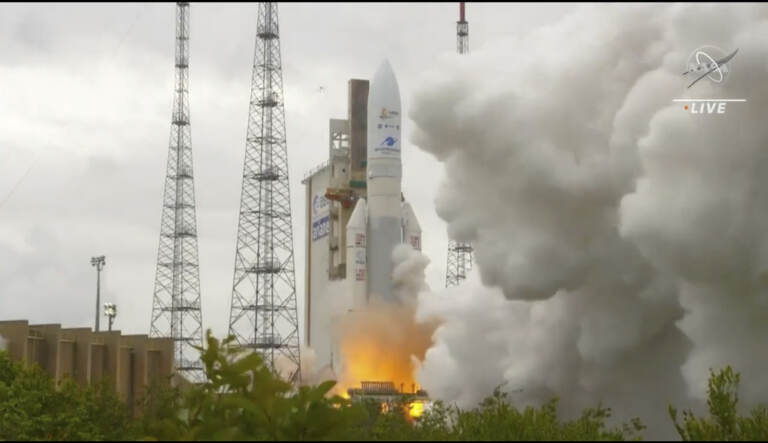In this image released by NASA, Arianespace's Ariane 5 rocket with NASA's James Webb Space Telescope onboard, lifts off Saturday, Dec. 25, 2021, at Europe's Spaceport, the Guiana Space Center in Kourou, French Guiana. The $10 billion infrared observatory is intended as the successor to the aging Hubble Space Telescope