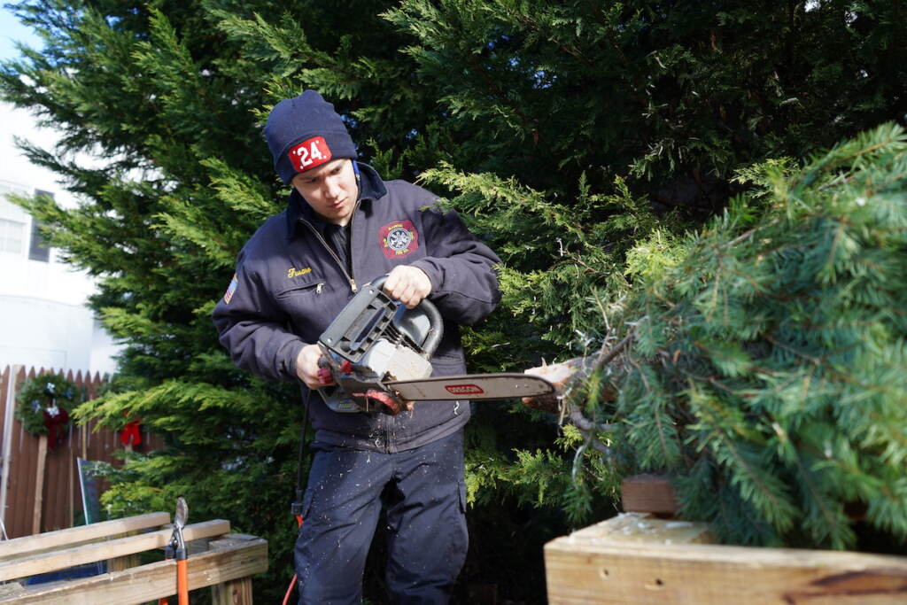 GladwyGladwyne firefighters offer the whole service during their Christmas tree sale, including some light touch-ups to even out the bottom of trees before they find their way to new homesne Firefighters offer the whole service during their Christmas tree sale including some light touch ups to even out the bottom of trees before they find their way to a home Gladwyne firefighters offer the whole service during their Christmas tree sale, including some light touch-ups to even out the bottom of trees before they find their way to new homes