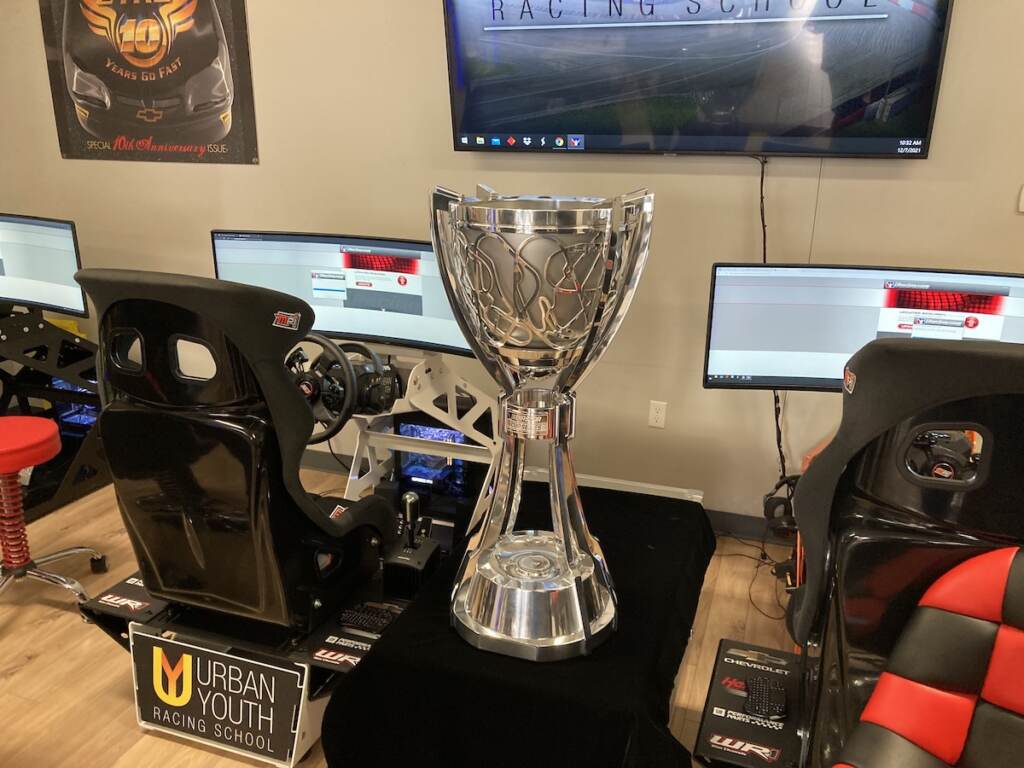 The Bill France Cup, won by NASCAR champion Kyle Larson, on display at the Urban Youth Racing School in Philadelphia