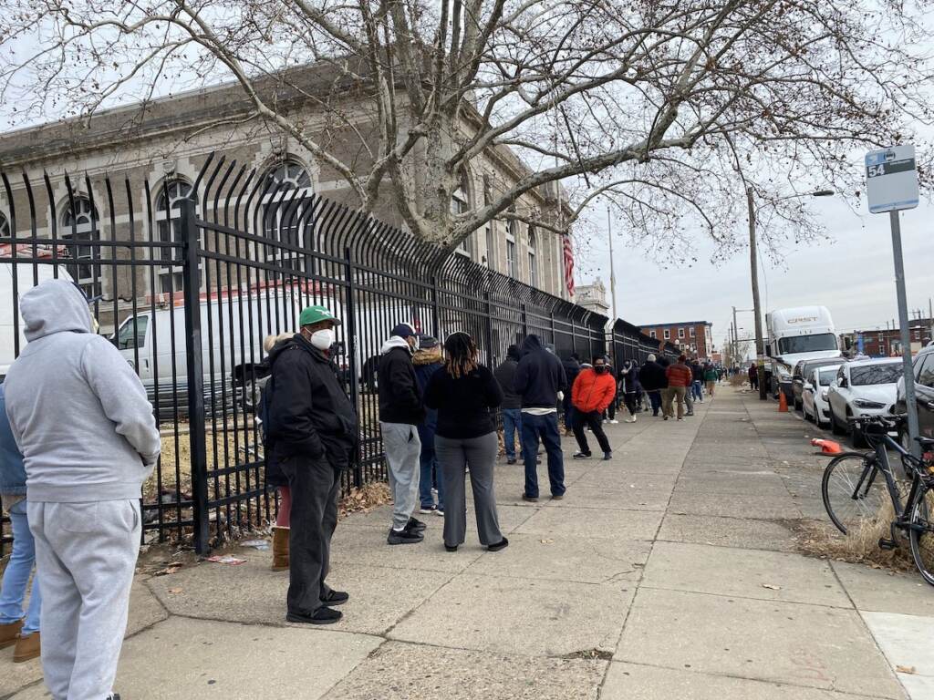 TESTING_4 The line outside the Lillian Lillian Marrero Library stretched around three sides of a full city block. (Liz Tung/WHYY)
