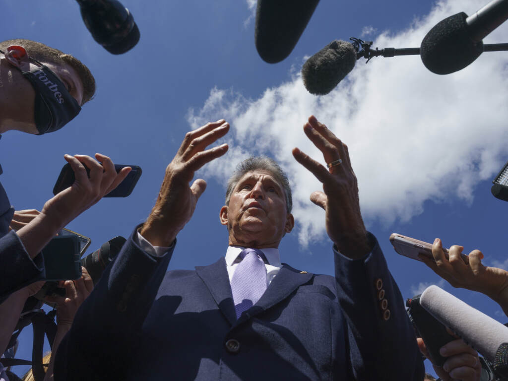 Sen. Joe Manchin, D-W.Va., speaks with reporters on Capitol Hill on Sept. 30, 2021. Sen. Joe Manchin, D-W.Va., a centrist Democrat vital to the fate of President Joe Biden's $3.5 government overhaul, updates reporters about his position on the bill, at the Capitol in Washington, Thursday, Sept. 30, 2021. Despite months of being courted and cajoled, Sen. Joe Manchin is still not a yes on President Joe Biden's big $2 trillion domestic package and has thrown Democrats into turmoil. (AP Photo/J. Scott Applewhite, File)