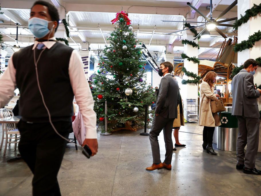 People wear face coverings inside Grand Central Market