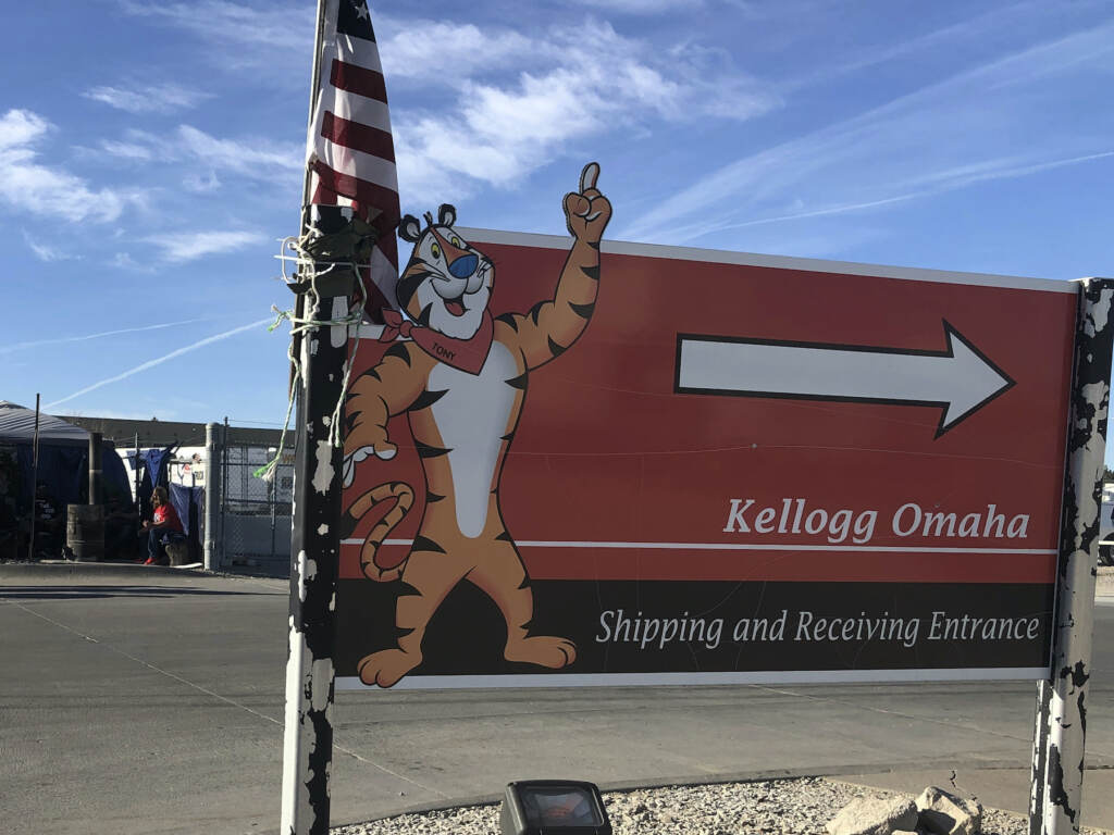 Kellogg’s Strike A Tony the Tiger decal gestures nexts to a sign that says Kellogg Omaha