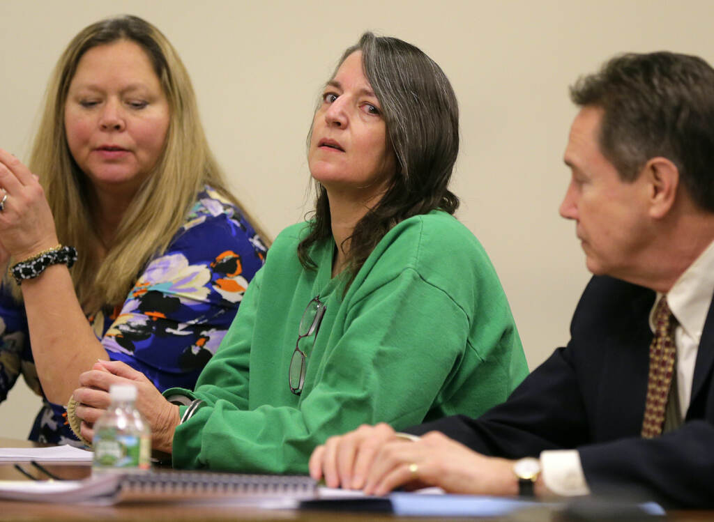 US-Cold-Case-Mother Michelle Lodzinski (center) appears for her sentencing