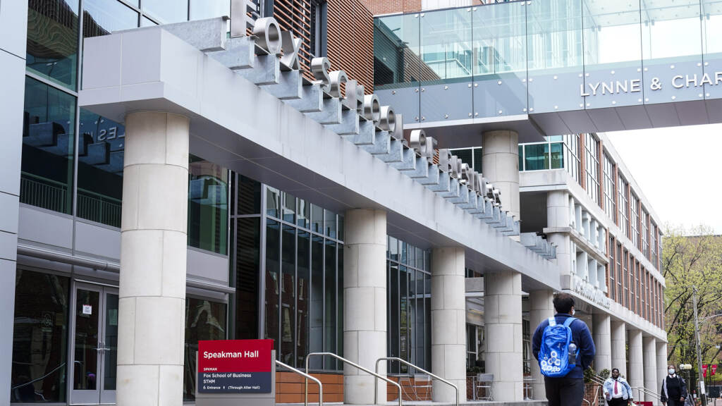 University Rankings Temple People walk past the Fox School of Business