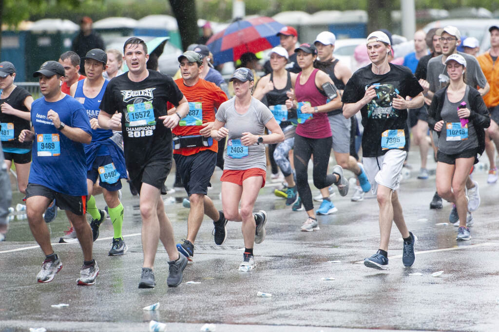 Broad Street Race participants are pictured running in the rain