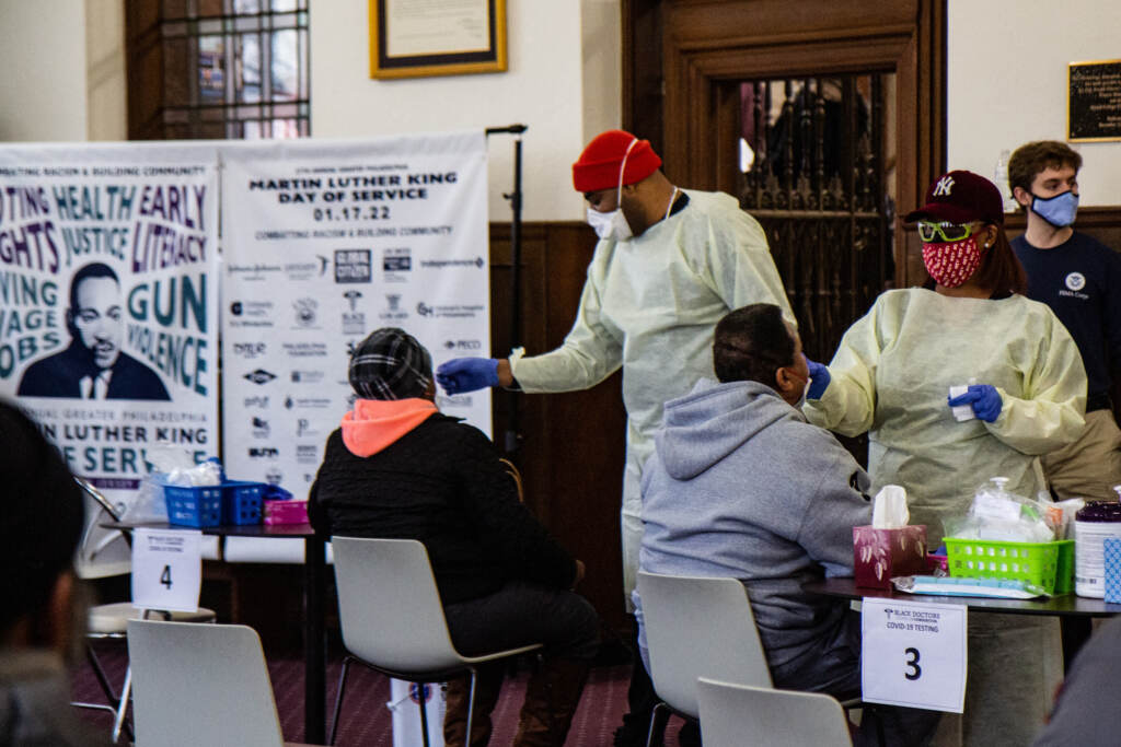 2022 01 22 kpaynter covid-19 testing girard college mlk day-3 Rich Davis (left) and Shani George (right) administer COVID-19 tests