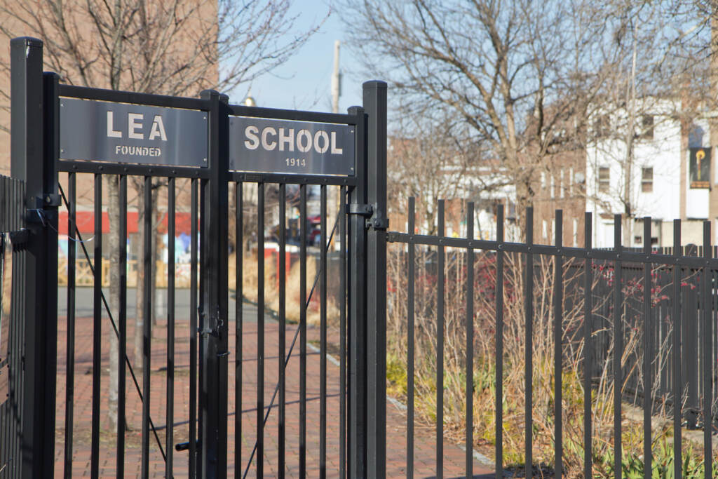 Henry C. Lea Elementary school in West Philadelphia. (Kimberly Paynter/WHYY) A gate with signage for Henry C. Lea Elementary School