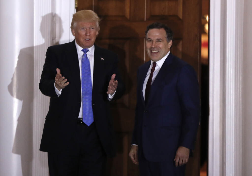 David McCormick poses with former President Donald Trump at the Trump National Golf Club Bedminster clubhouse, Sunday, Nov. 20, 2016, in Bedminster, N.J. McCormick is considering running in the 2022 Republican primary election for Pennsylvania's open U.S. Senate seat. (AP Photo/Carolyn Kaster, File)
