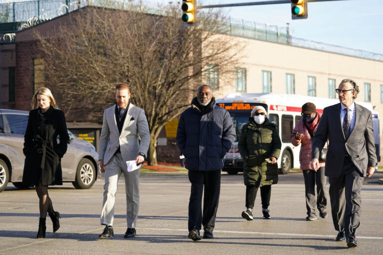 Willie Stokes, center, walks from a state prison in Chester, Pa., on Tuesday, Jan. 4, 2022 after his 1984 murder conviction was overturned because of perjured witness testimony. Stokes was serving a life sentence and spent decades in prison before learning the witness who testified against him at a 1984 court hearing soon pleaded guilty to perjury over the testimony.