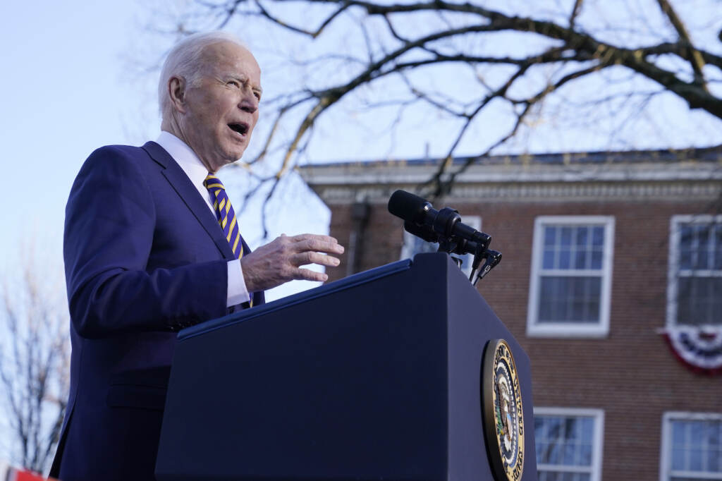Joe Biden President Joe Biden speaks from a podium
