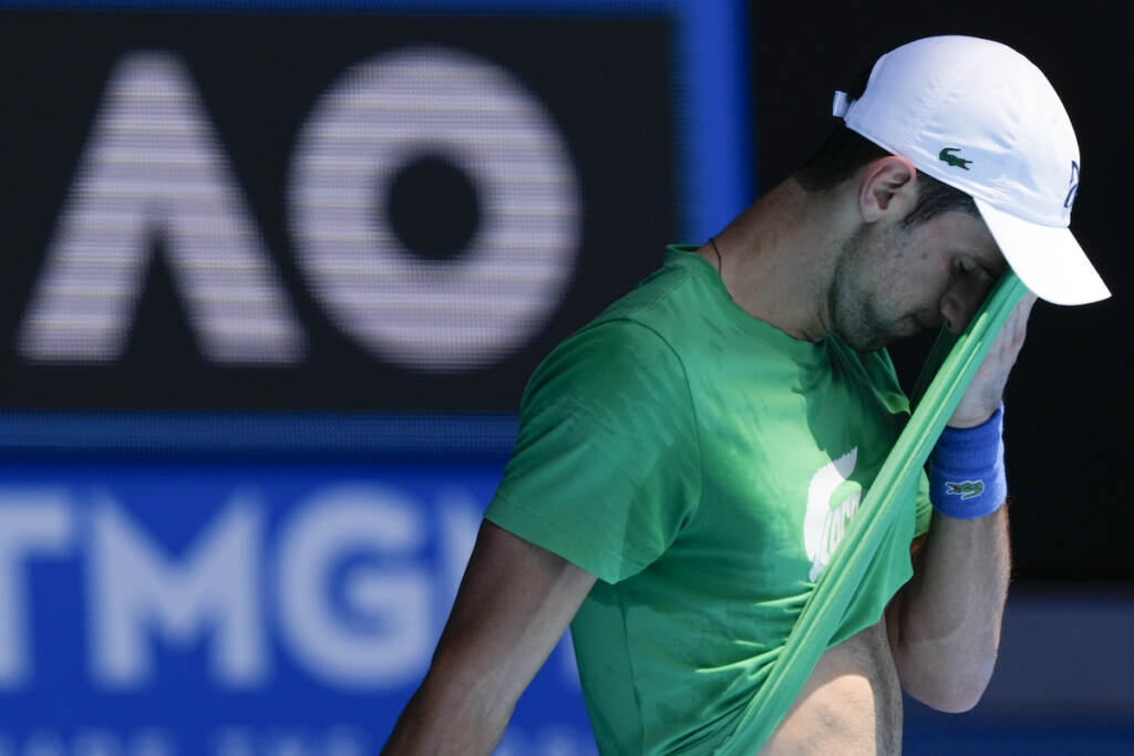 APTOPIX Australian Open Djokovic Defending men’s champion Serbia’s Novak Djokovic practices on Margaret Court Arena ahead of the Australian Open tennis championship in Melbourne, Australia, Thursday, Jan. 13, 2022. (AP Photo/Mark Baker)