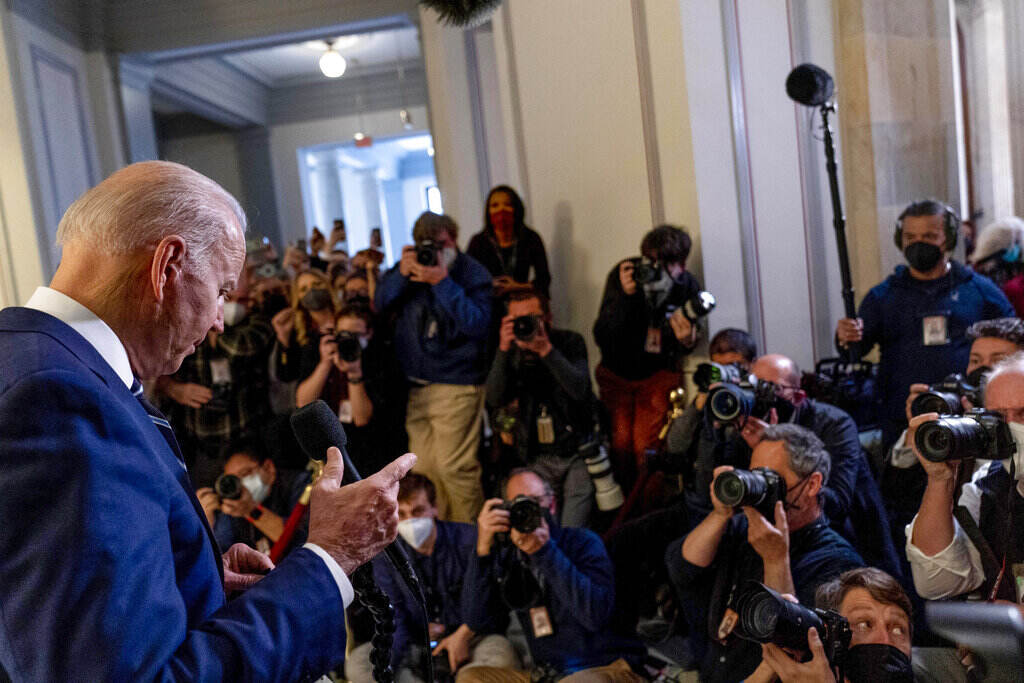 Joe Biden President Joe Biden pauses while speaking to members of the media as he leaves a meeting with the Senate Democratic Caucus to discuss voting rights and election integrity on Capitol Hill in Washington, Thursday, Jan. 13, 2022. (AP Photo/Andrew Harnik)