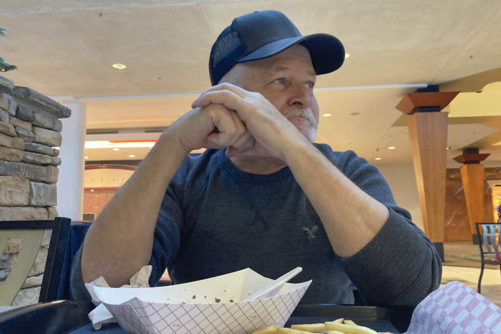 Biden One Year American Vocies Craig Prichard, 65, of Des Moines, Iowa, who voted for Donald Trump in 2016, but says he voted for Joe Biden in 2020 believing Trump had failed to the confront the coronavirus pandemic, talks on Jan. 10, 2022. The retired factory worker says he is