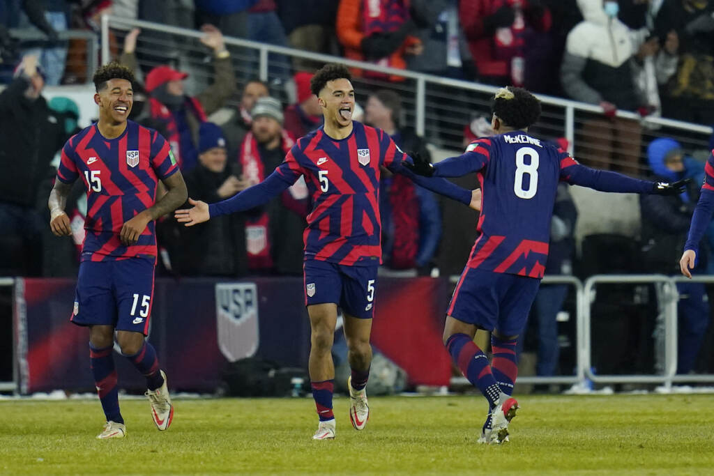 WCup El Salvador US Soccer United States’ Antonee Robinson (5) celebrates his goal with Weston McKennie (8) and Chris Richards (15) during the second half of a FIFA World Cup qualifying soccer match against El Salvador, Thursday, Jan. 27, 2022, in Columbus, Ohio