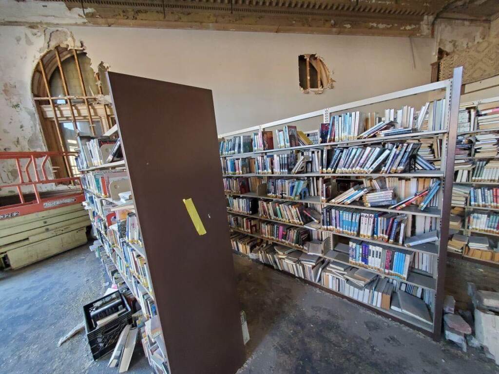 Image from iOS Thousands of books from the long shuttered Camden Free Public Library on Federal Street we're picked up by two organizations that will in turn give them away. (Photo: Tom Martin)