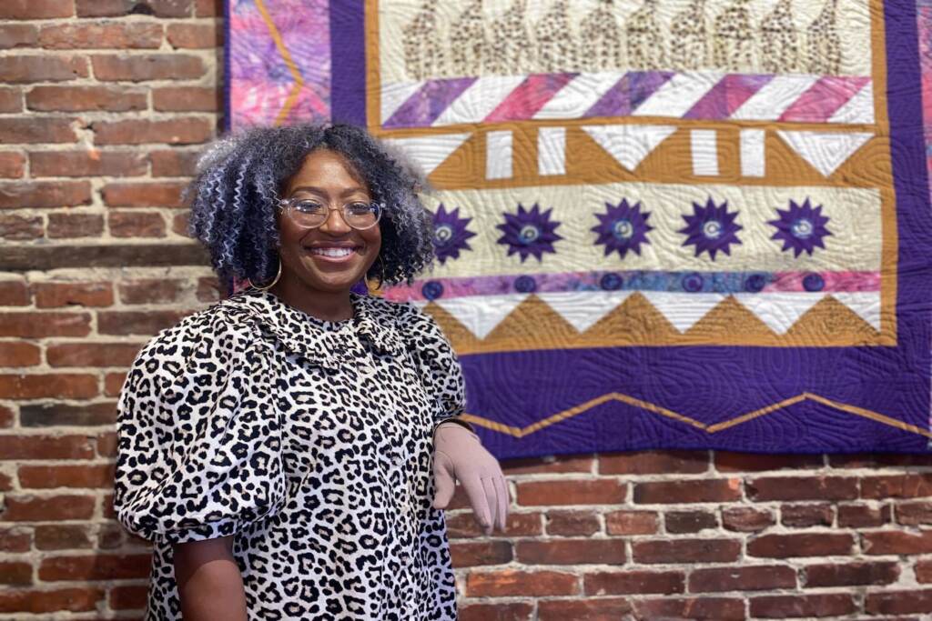 Renata Merrill at her solo art exhibit at Camden Fireworks in Camden, NJ. (Tennyson Donyéa)