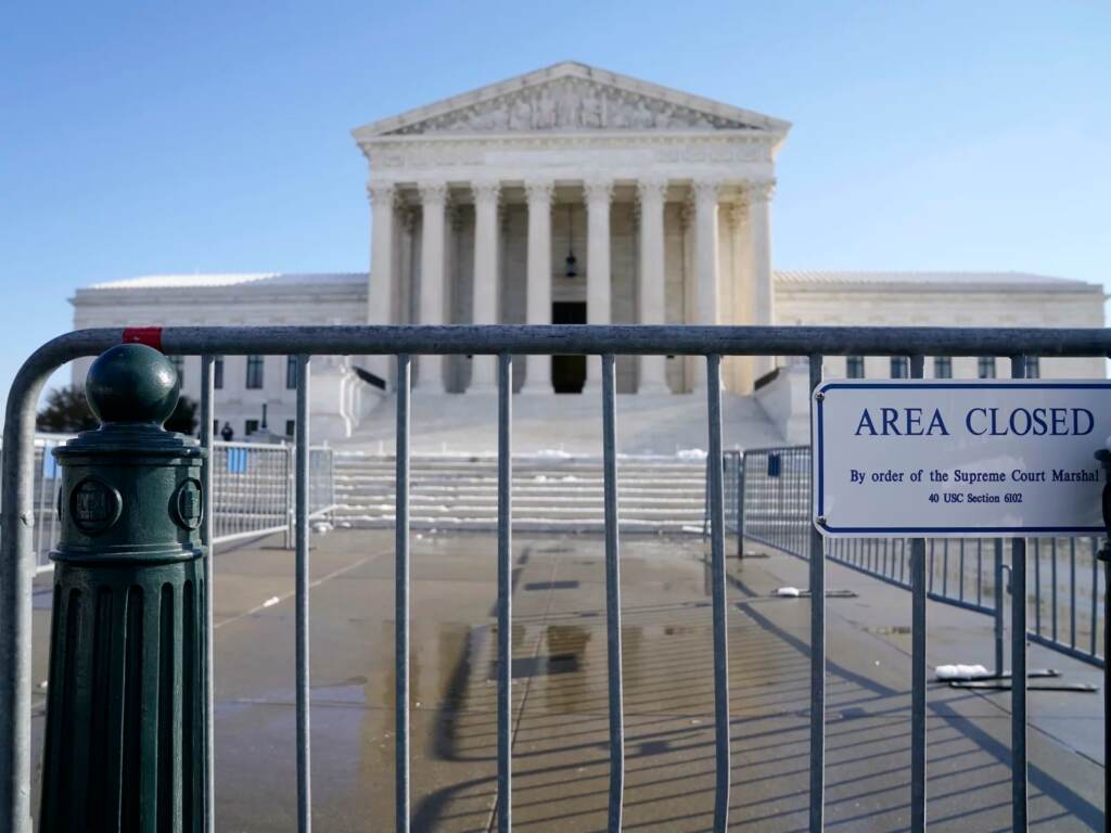 ap_22007564463868-a9ef53880113ba60d865ba4643fb394af3a58453-s1600-c85 The Supreme Court shown Friday, Jan. 7, 2022, in Washington. The Supreme Court is taking up two major Biden administration efforts to bump up the nation's vaccination rate against COVID-19 at a time of spiking coronavirus cases because of the omicron variant